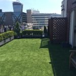 Artifical turf laid to create a beautiful low maintenance roof top garden and Vintners Hall