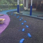 Creating Patterens in the Safety Surfacing at Meath Gardens-min