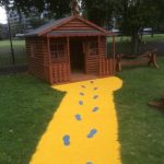 Finished pathways created out of safety surfacing at Meath Gardens Childrens Center-min